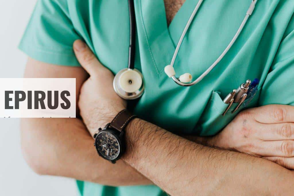 Crop doctor with stethoscope in hospital