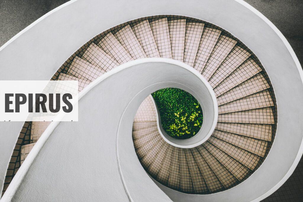white and brown concrete spiral stairs