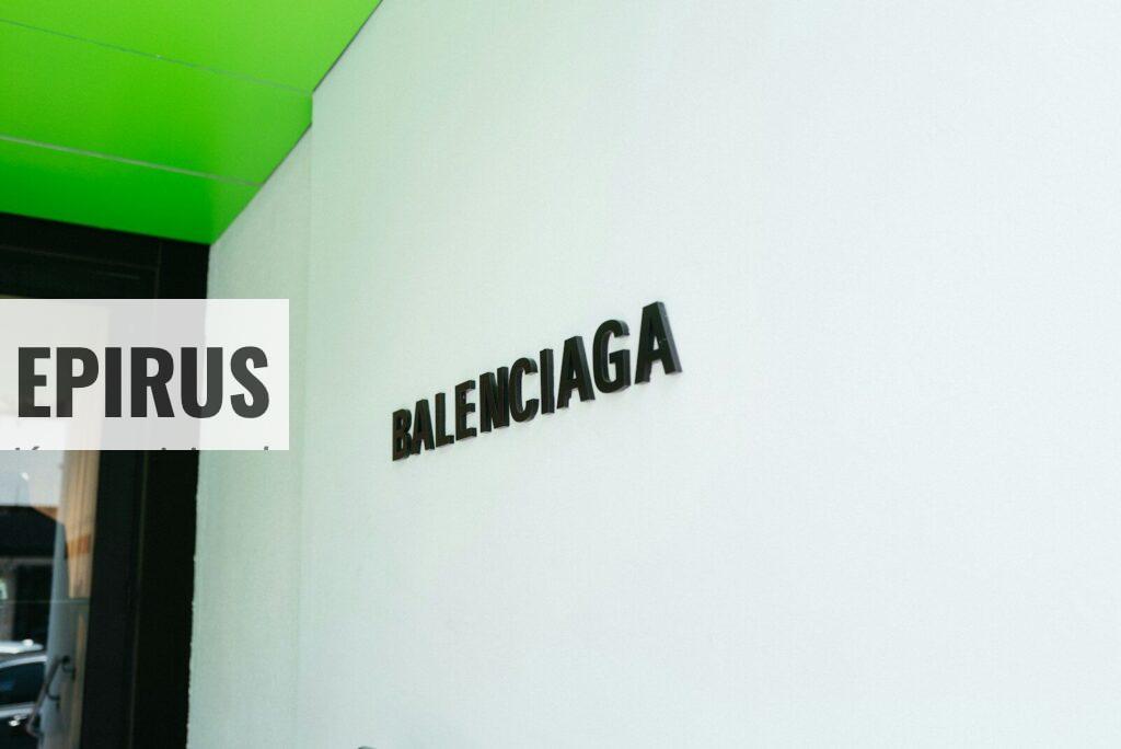 a white wall with a sign that says balenocaga on it