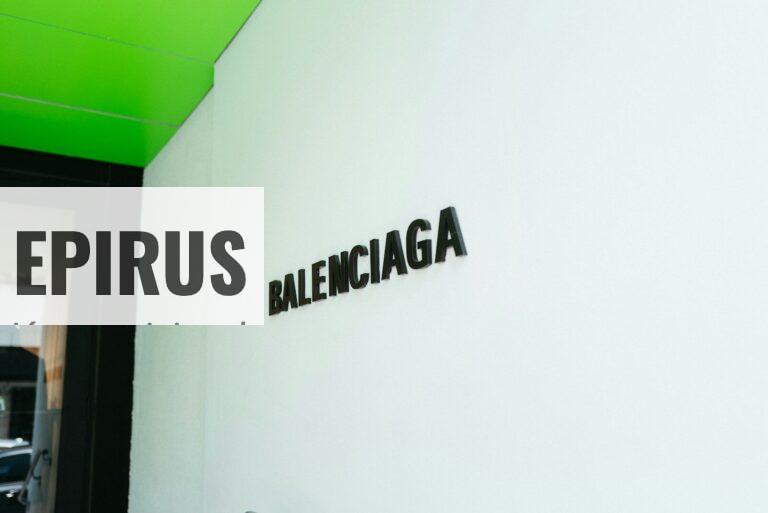 a white wall with a sign that says balenocaga on it